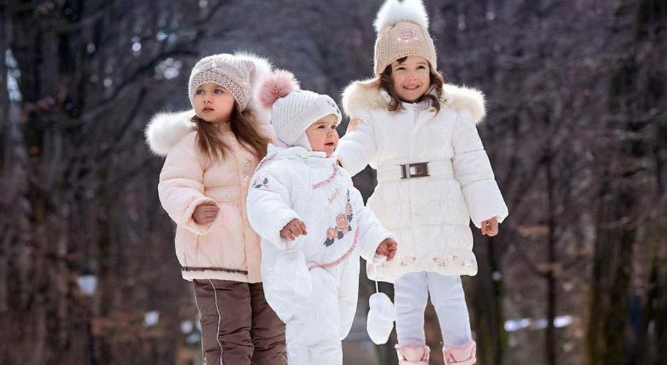 Children outdoors in winter clothes